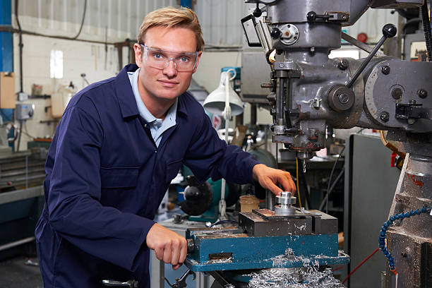 istock Portrait Of Engineer Using Drill In Factory 480761354