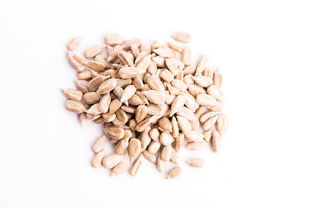 istock sunflower seeds isolated on white 480764318