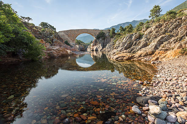Ponte Vecchiu bridge over Fango river in Corsica stock photo
