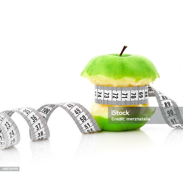White Measuring Tape And Apple Stock Photo - Download Image Now - Backgrounds, Dieting, Food