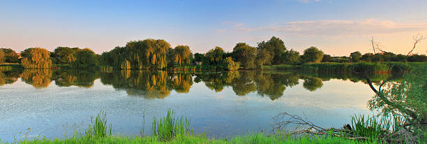 istock Panorama of sunrise on the river 480773866