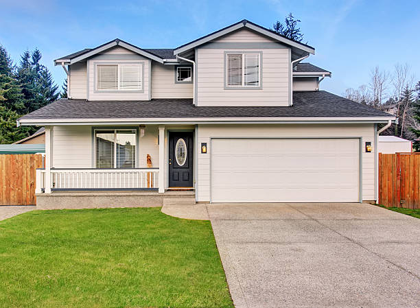 istock Traditional northwest home with driveway. 480774836