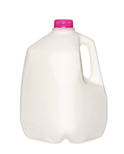 istock gallon Milk Bottle with pink Cap Isolated on White 480775304