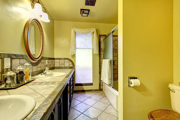 istock Elegant bathroom with stone wall trim 480775541
