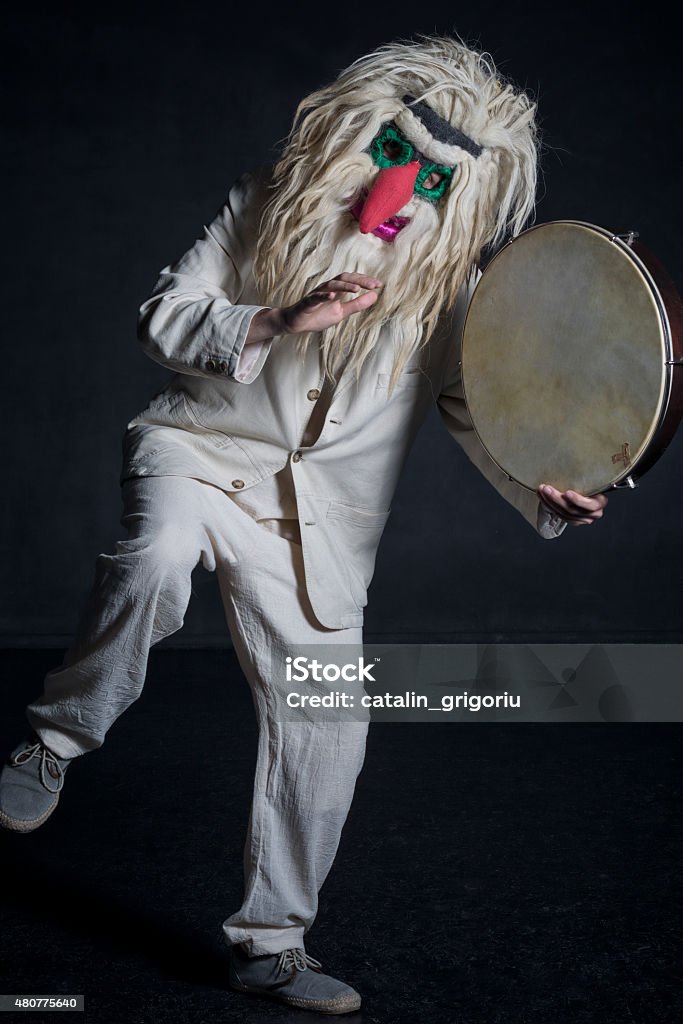 portrait of witch doctor portrait of witch doctor wearing a traditional Romanian mask 2015 Stock Photo