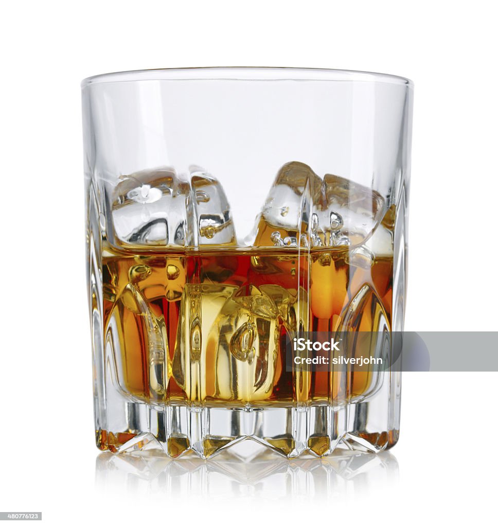 Glass of whiskey and ice isolated on white background Whiskey Stock Photo