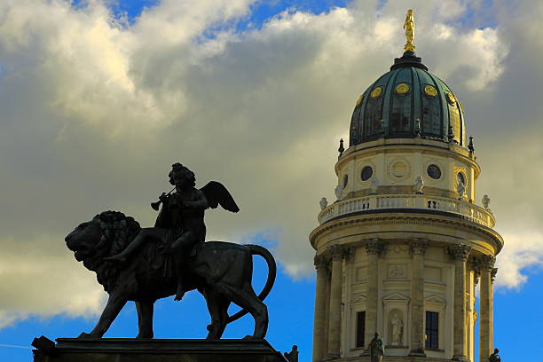 istock French cathedral in German Berlin, lion and angel, Germany 480777433