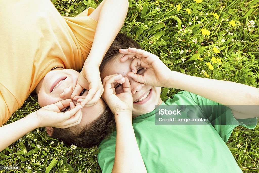 happy children on meadow Cheerful Stock Photo