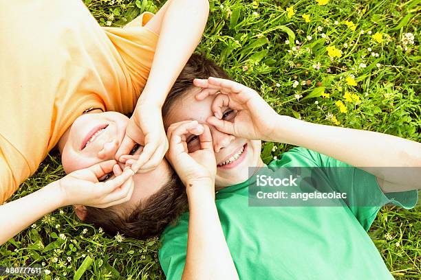 Happy Children On Meadow Stock Photo - Download Image Now - Cheerful, Child, Childhood