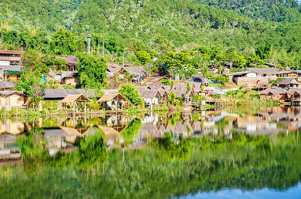 istock reflection of old village in ban rak thai 480778880