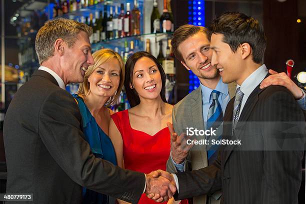 Meeting After Work Stock Photo - Download Image Now - Business, Greeting, Laughing