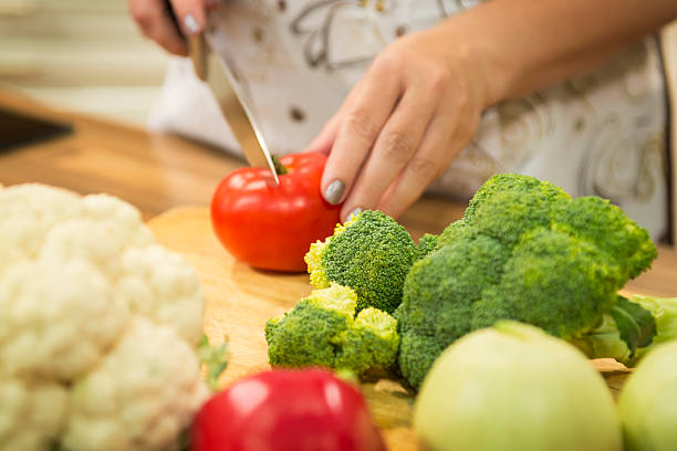 istock Fresh vegetables with unrecognizable person in the background. 480779240