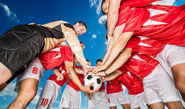 istock Soccer team against blue sky. 480779337