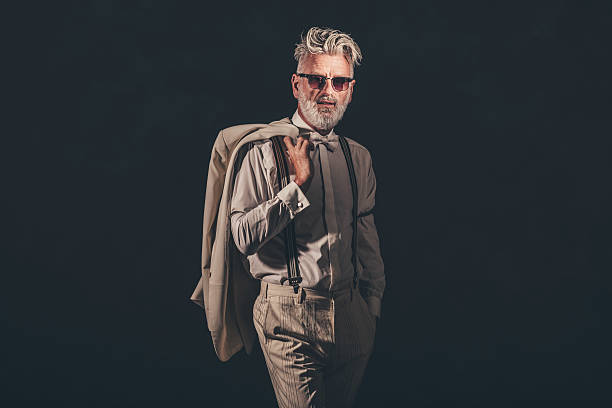 istock Elegant Bearded Man Holding Coat Over his Shoulder 480780072