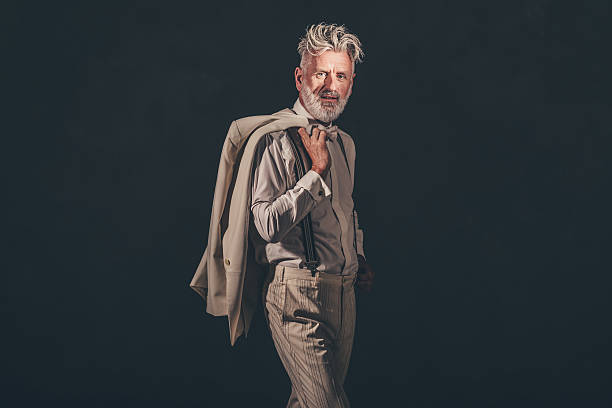 istock Matured Man Holding his Coat Over his Shoulder 480780082