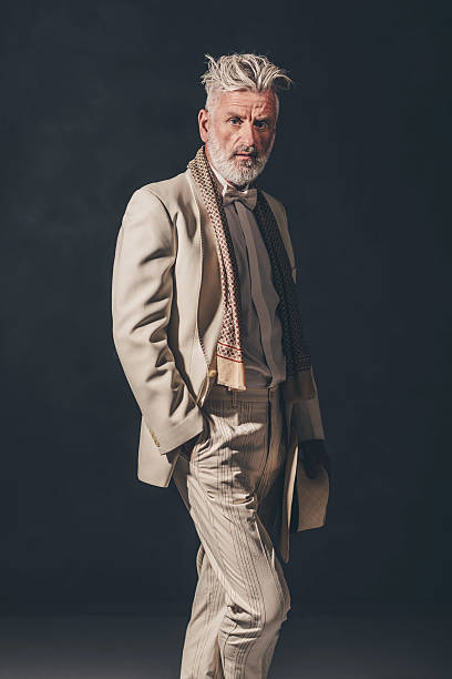 istock Fashionable Senior Bearded Man Against Black Wall 480780094