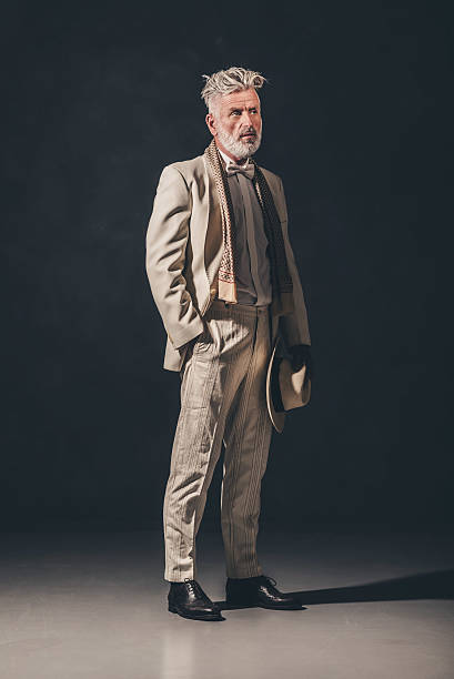istock Thoughtful Elegant Senior Guy Against Black Wall 480780100