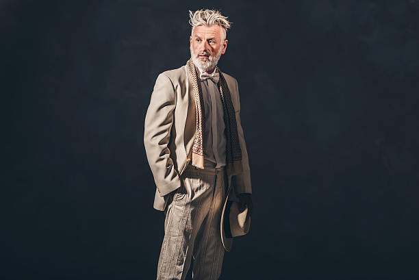 istock Fashionable Senior Bearded Man Against Black Wall 480780102