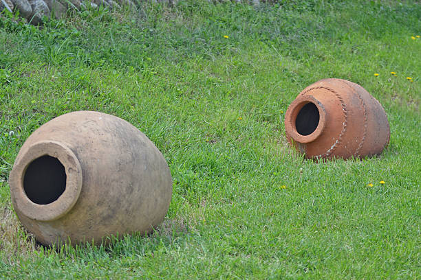 istock Clay jug on the green grass, Georgia 480780514
