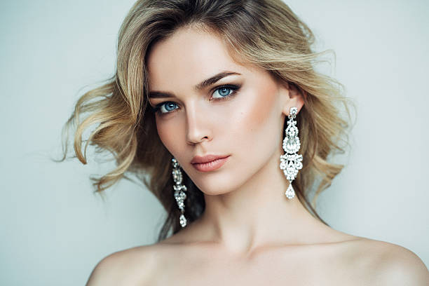 istock Beautiful girl with shiny earrings 480782814