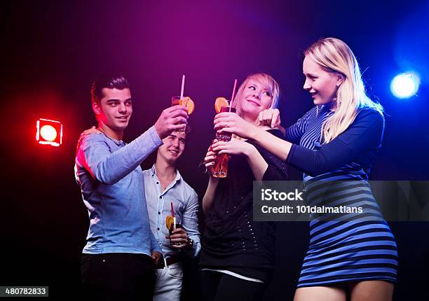 Group Of Young Friends In Nightclub Stock Photo - Download Image Now - 20-29 Years, Adult, Beautiful People