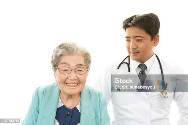 Smiling Doctor And Senior Woman Stock Photo - Download Image Now - Adult, Adults Only, Affectionate