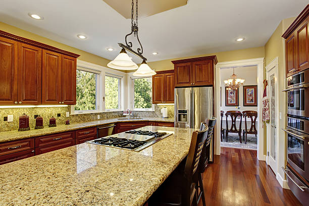 istock Traditional kitchen with nice counters and dark hardwood floor. 480784724