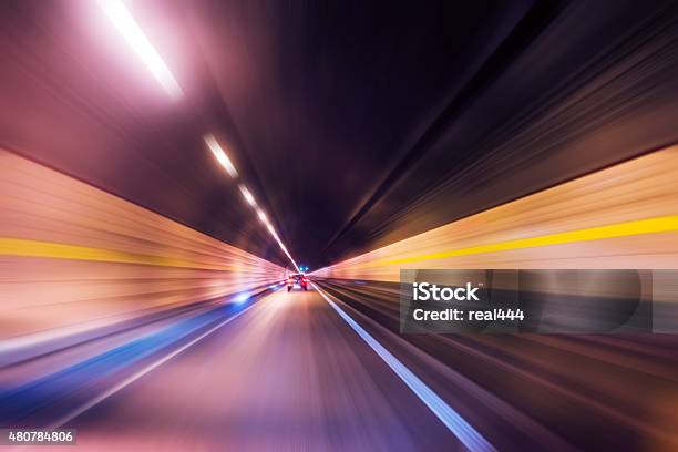 Speeding Through Tunnel Stock Photo - Download Image Now - 2015, Asphalt, Blue