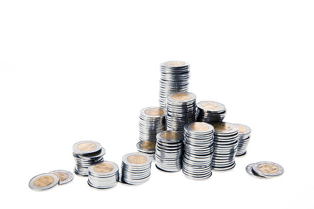 istock Mexican pesos arranged in stacks isolated on white 480784897