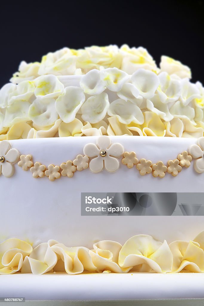 Wedding cake with flowers Detail of wedding cake with flowers Arrangement Stock Photo