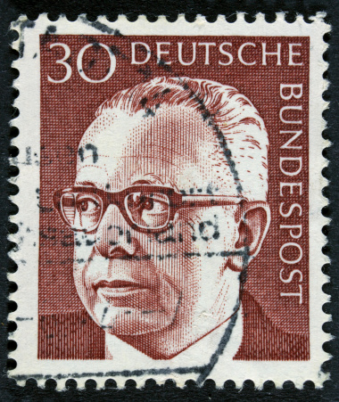 GERMANY - CIRCA 1971 A stamp printed in Germany showing a portrait of Federal President Gustav Walter Heinemann, circa 1971.