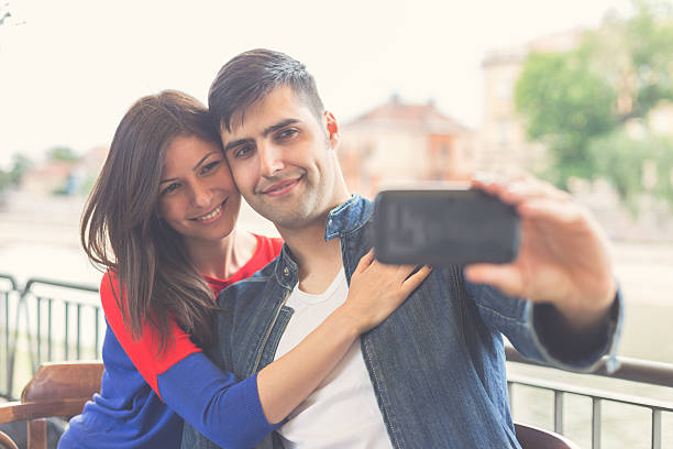 istock Happy couple making selfie in cafe 480790312