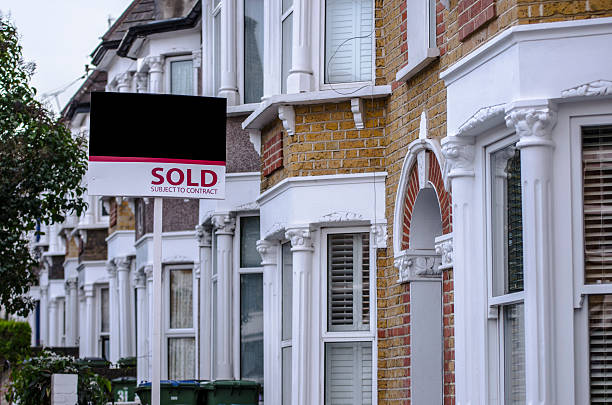 istock British houses with sold sign 480794559