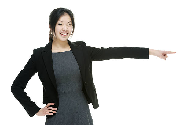istock Smiling businesswoman pointing away 480801830
