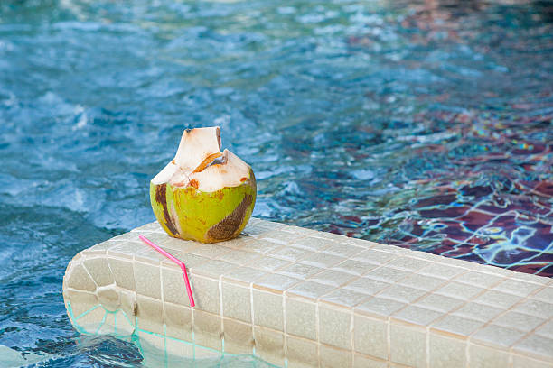 istock Coconut with straws to drink 480802210