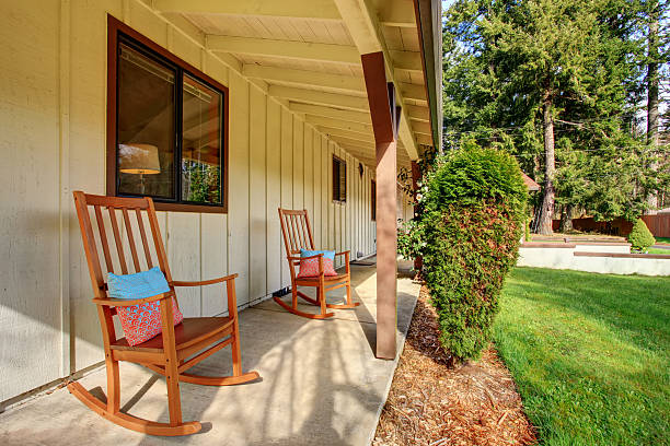 istock Simple little front porch with two rocking chairs. 480802556