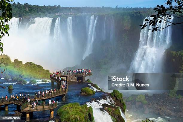 Tourists At Iguazu Falls Foz Do Iguacu Brazil Stock Photo - Download Image Now - Iguacu Falls, Foz do Iguaçu, Iguacu River