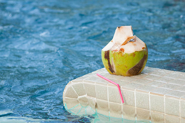 istock Coconut with straws to drink 480805794