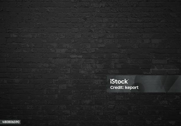 Old Brick Wall With Black Stones Stock Photo - Download Image Now - Brick, Black Color, Dark