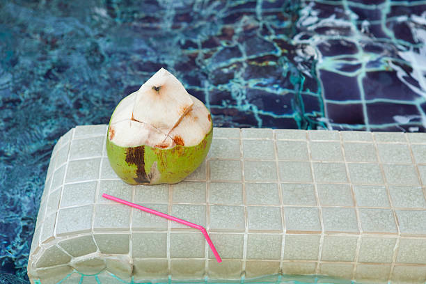 istock Coconut with straws to drink 480807090