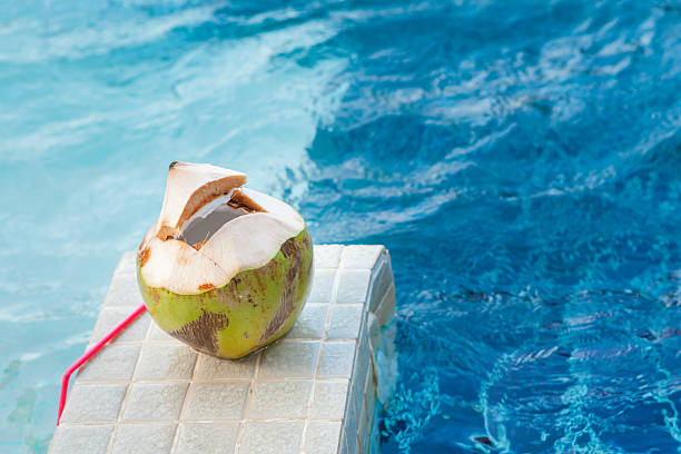 istock Coconut with straws to drink 480807092