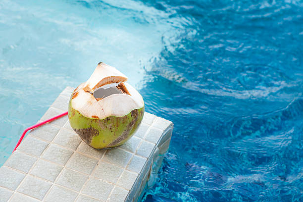 istock Coconut with straws to drink 480807094
