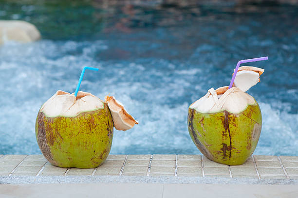istock Coconut with straws to drink 480807096