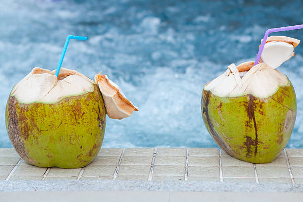 istock Coconut with straws to drink 480807098