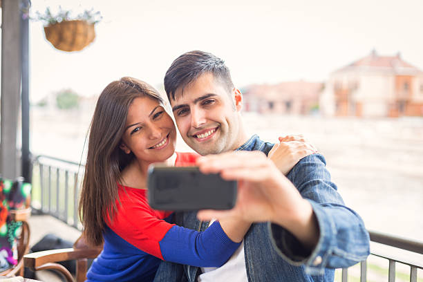 istock Happy couple making selfie in cafe 480809334