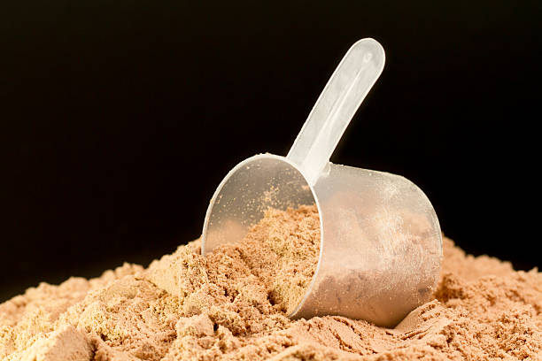 istock Whey protein drink powder on a black background 480811776