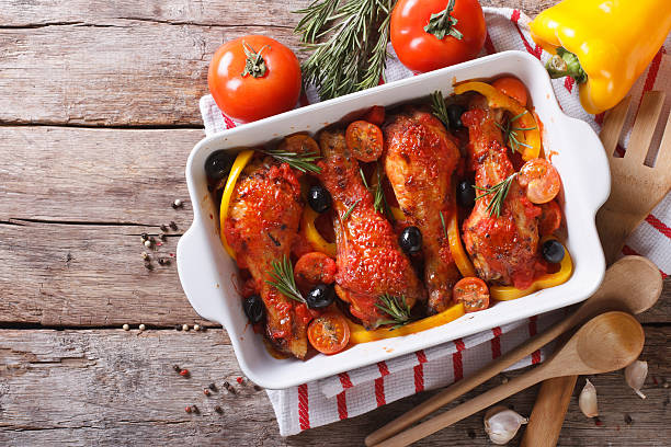 istock Chicken legs baked in tomato sauce horizontal top view 480813092