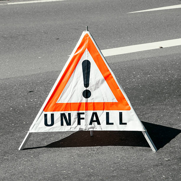 accident warning sign at the street for other cars