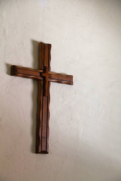 istock Handmade Wooden Cross on a Wall 480816721