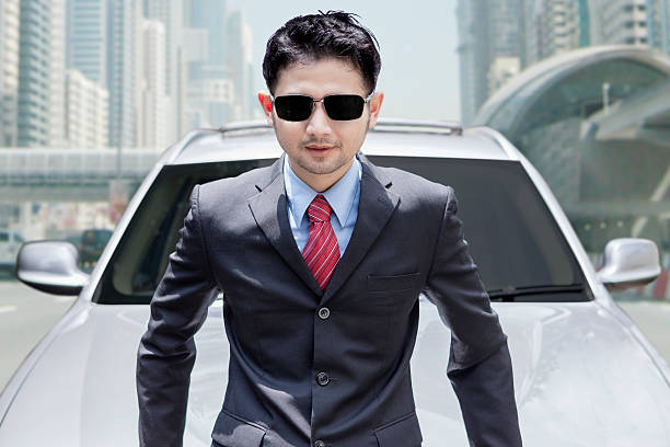 istock Young man with new car on the road 480816754